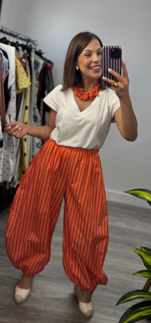 Pantalón bombacho de rayas naranja