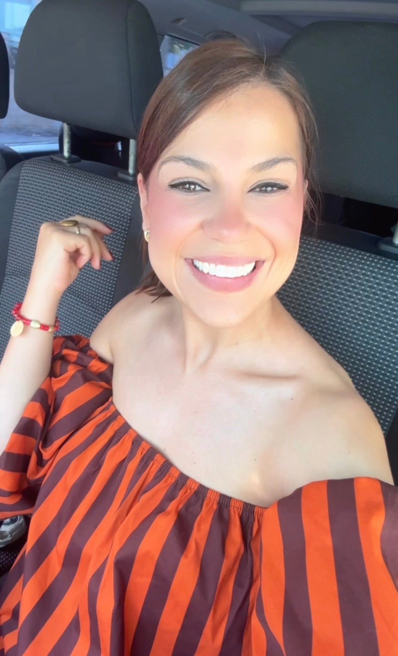 Blusa de rayas naranja